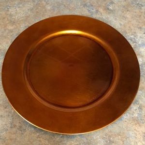 Copper colored chargers.